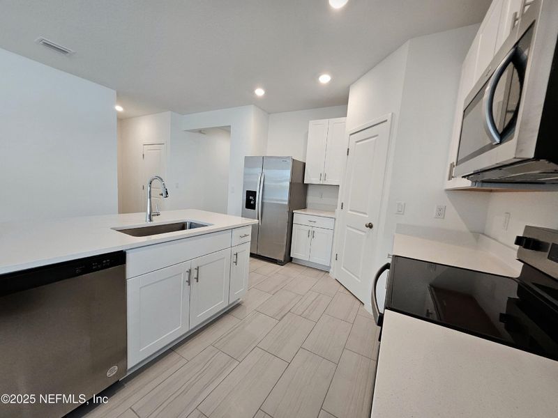 Furnished interior view inside a new home in Lakes at Bella Lago - Signature Series, Green Cove Springs (Image 4).