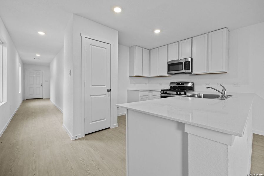 Furnished interior view inside a new home in Spring Grove, St. Hedwig (Image 4).