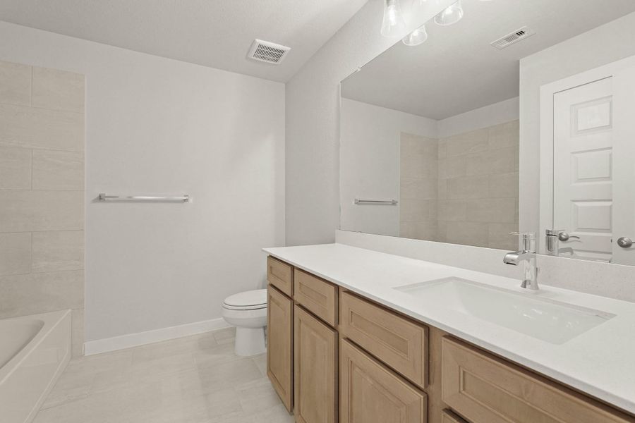 Furnished interior view inside a new home in Briarwood Crossing, Rosenberg (Image 12).