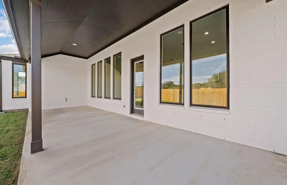 Exterior details and patio area of a home in 6 Creeks, Kyle (Image 3). Exterior details and patio area of a home in 6 Creeks, Kyle (Image 3).