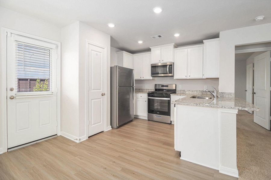 Furnished interior view inside a new home in Park Vista at El Tesoro, Houston (Image 5).