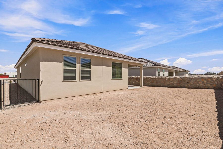 Exterior details and patio area of a home in Paseos Del Este, El Paso (Image 34).