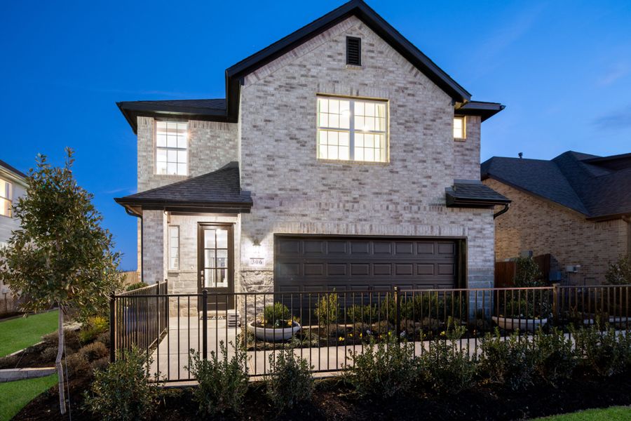 Representative exterior photo of a completed home built from the Kingston by UnionMain Homes in Elevon, Lavon, TX (Image 32).