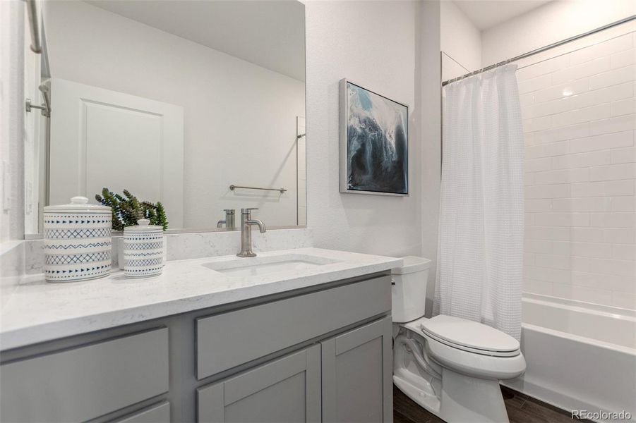 Furnished interior view inside a new home in The Commons at Victory Ridge, Colorado Springs (Image 28).