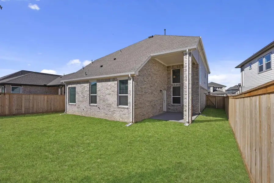 Exterior details and patio area of a home in Bridgeland, Cypress (Image 4). Exterior details and patio area of a home in Bridgeland, Cypress (Image 4).
