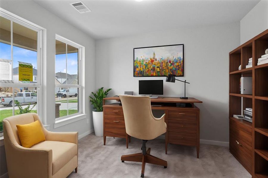 Quietly nestled in front of the home is the handsome home office. Featuring gorgeous flooring, high ceilings, large windows with privacy blinds and custom paint.