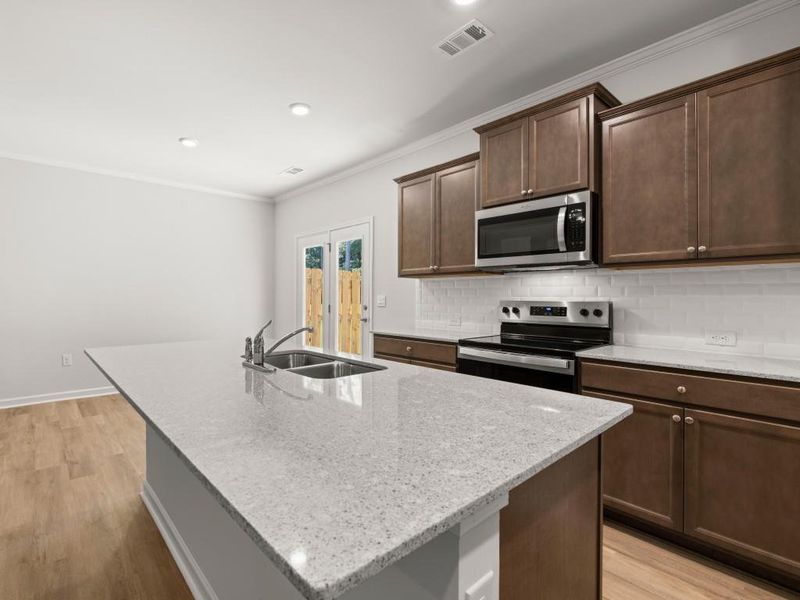 Furnished interior view inside a new home in Falcon Landing Townhomes, Gainesville (Image 12). Furnished interior view inside a new home in Falcon Landing Townhomes, Gainesville (Image 12).