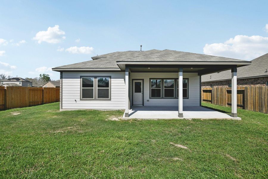 Exterior details and patio area of a home in Splendora Fields, Splendora (Image 3).