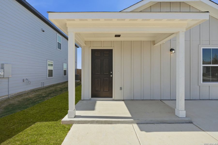 Exterior details and patio area of a home in Vista Real, Converse (Image 4).