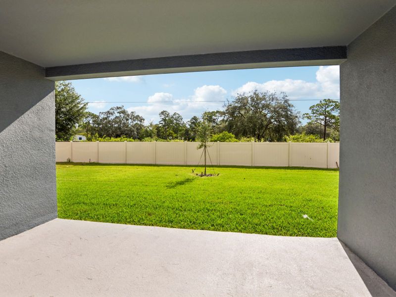 Exterior details and patio area of a home in Pine Ridge Meadows, Hudson (Image 16).