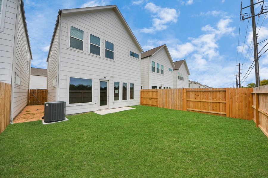 Front exterior of a new home in Agua, Houston, TX, highlighting curb appeal (Image 2). Front exterior of a new home in Agua, Houston, TX, highlighting curb appeal (Image 2).