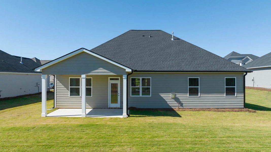 Front exterior of a new home in The Gates at Pates Creek, Hampton, GA, highlighting curb appeal (Image 17).