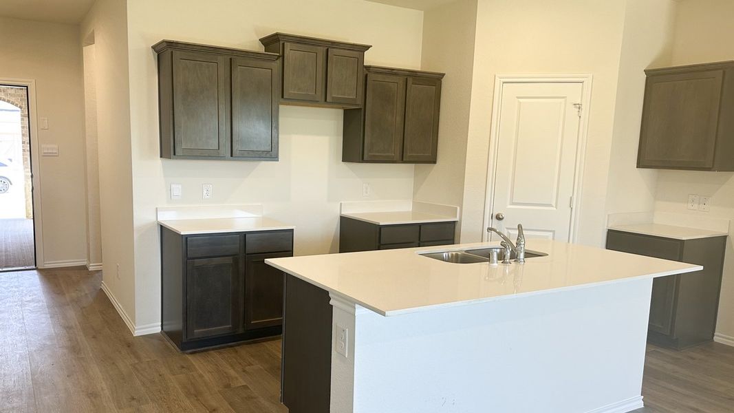 Representative furnished interior of a home built from the MIDLAND by D.R. Horton in Northspur, Forney (Image 6).