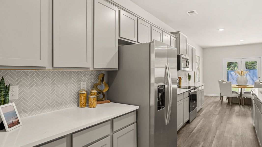 Representative furnished interior of a home built from the Halton by D.R. Horton in Jackson Landing, Jefferson (Image 17).