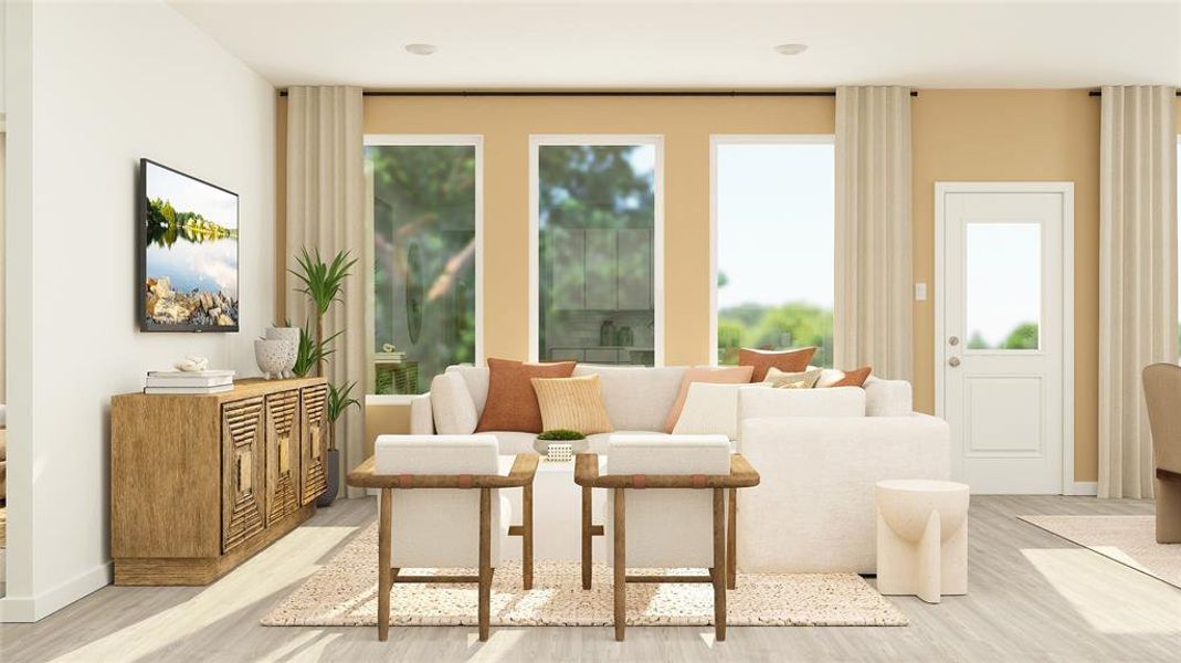 Living area with light hardwood / wood-style floors