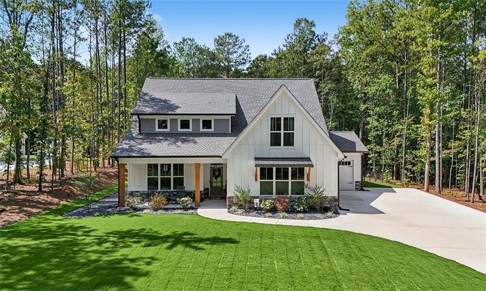 Front exterior of a new home in , Douglasville, GA, highlighting curb appeal (Image 31).