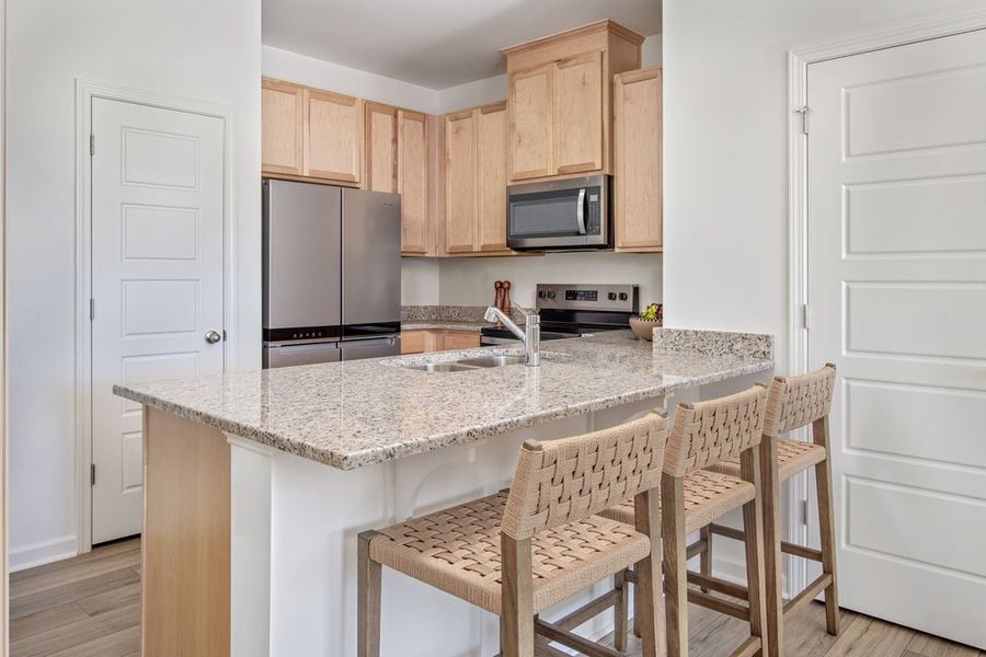 Representative furnished interior of a home built from the 1155 Modeled by KB Home in Brooks Mill - Edge Series, Durham (Image 6).