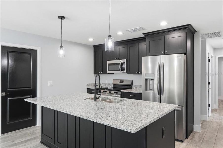 Furnished interior view inside a new home in , Auburndale (Image 9).