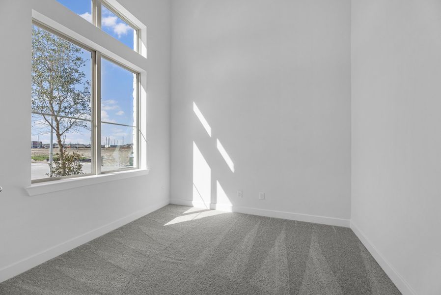 Spacious, unfurnished interior of a new home in Meridiana, Manvel (Image 16).