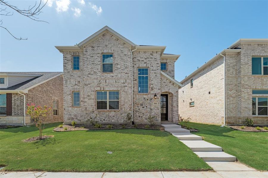 Front exterior of a new home in Arbors at Legacy Hills, Celina, TX, highlighting curb appeal (Image 16). Front exterior of a new home in Arbors at Legacy Hills, Celina, TX, highlighting curb appeal (Image 16).