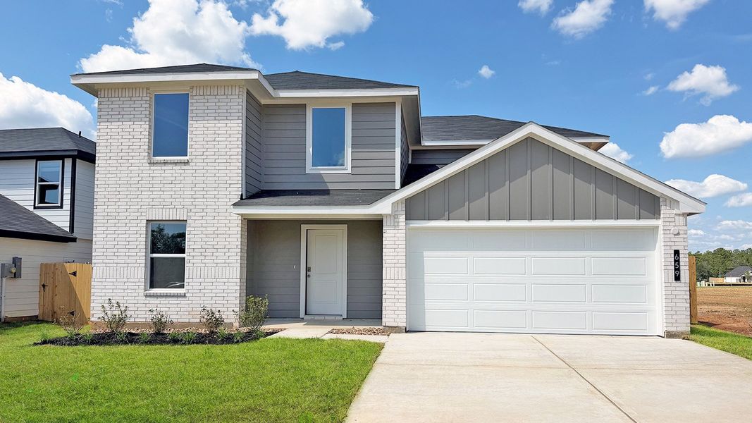 Front exterior of a new home in Silverthorne, Conroe, TX, highlighting curb appeal (Image 1). Front exterior of a new home in Silverthorne, Conroe, TX, highlighting curb appeal (Image 1).