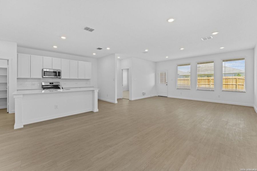 Spacious, unfurnished interior of a new home in Hightop Ridge, Converse (Image 13).