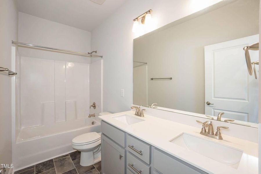 Furnished interior view inside a new home in Hidden Lake Estates, Greenville (Image 9).