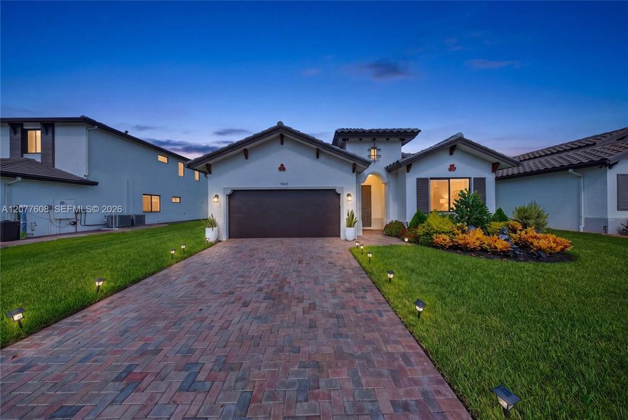 Front exterior of a new home in , Immokalee, FL, highlighting curb appeal (Image 27).