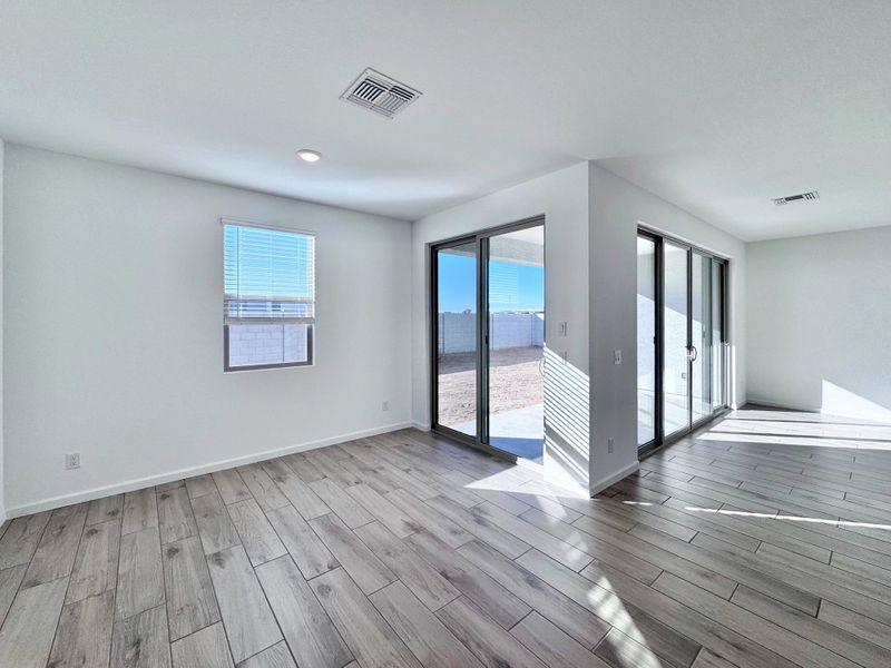 Dining nook with dual sliders to covered patio Dining nook with dual sliders to covered patio