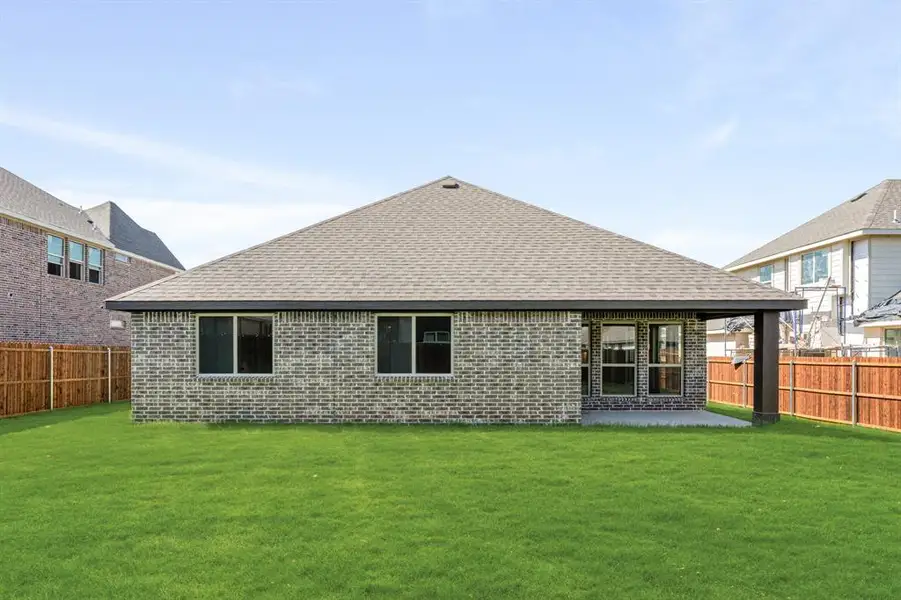 Exterior details and patio area of a home in Maplewood, Glenn Heights (Image 3). Exterior details and patio area of a home in Maplewood, Glenn Heights (Image 3).