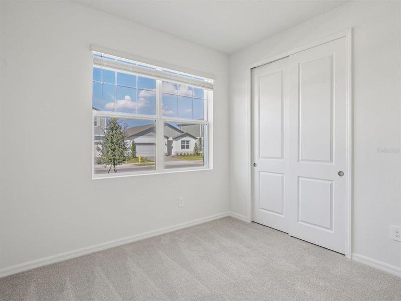 Spacious, unfurnished interior of a new home in Coasterra - Reserve Series, Palmetto (Image 28).