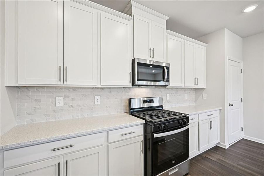 Furnished interior view inside a new home in Avalon - Reserve Series, Conyers (Image 11). Furnished interior view inside a new home in Avalon - Reserve Series, Conyers (Image 11).