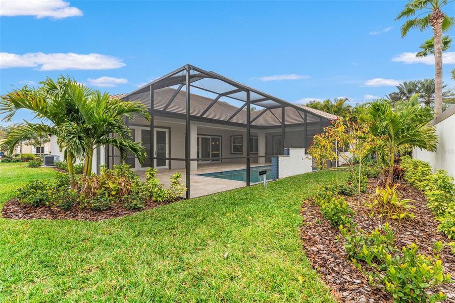 Exterior details and patio area of a home in , Trinity (Image 33).