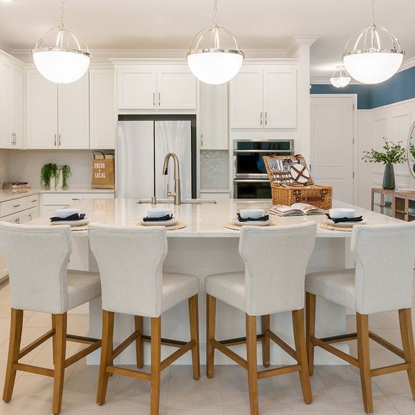 Representative furnished interior of a home built from the Hampton II by Park Square Residential in Leela Reserve, Tavares (Image 15).