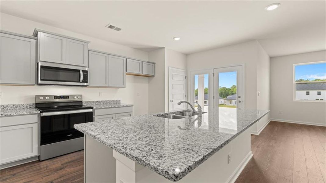 Furnished interior view inside a new home in Champion's Run, Lithonia (Image 8).