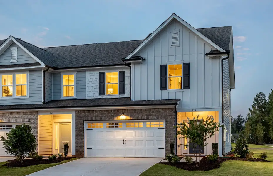 Front exterior of a new home in Exchange at 401, Raleigh, NC, highlighting curb appeal (Image 2).