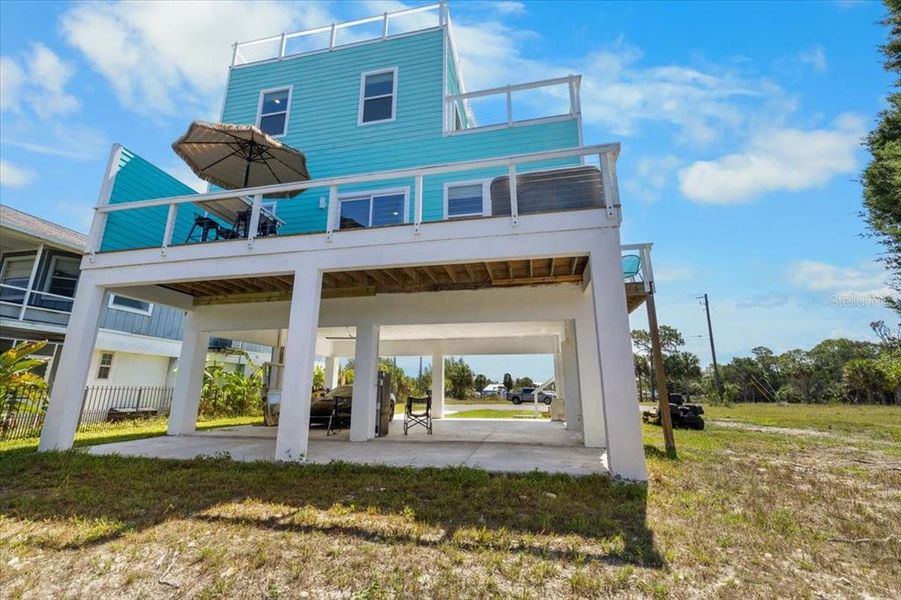 Exterior details and patio area of a home in , Hernando Beach (Image 28).