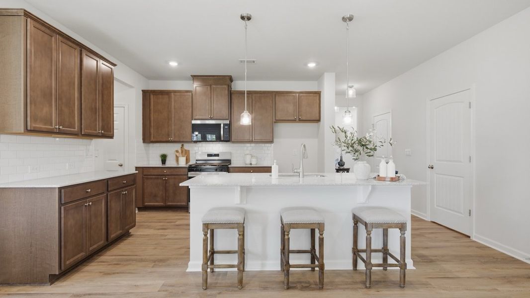 Representative furnished interior of a home built from the Belfort by D.R. Horton in Hamptons at Riverwood North, Dallas (Image 9).