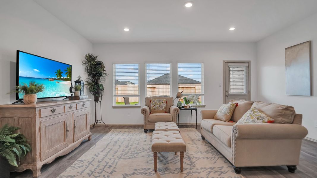Representative furnished interior of a home built from the MITCHELL by D.R. Horton in Westward Pointe, Sealy (Image 9).