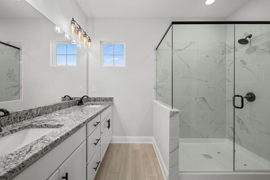 Representative furnished interior of a home built from the The Baldwin by UnionMain Homes in Austin Springs, Bethlehem (Image 11).