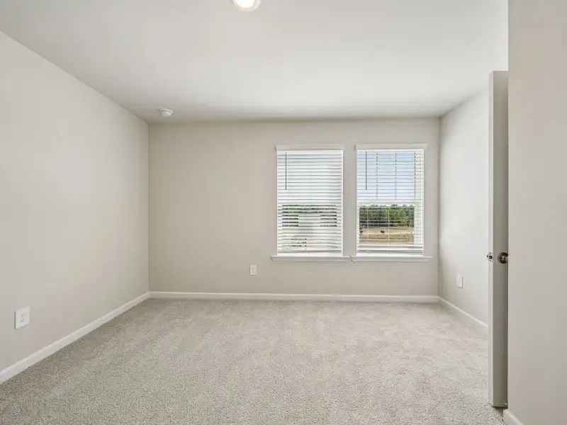 Spacious, unfurnished interior of a new home in Brooks Lake, Loganville (Image 13).