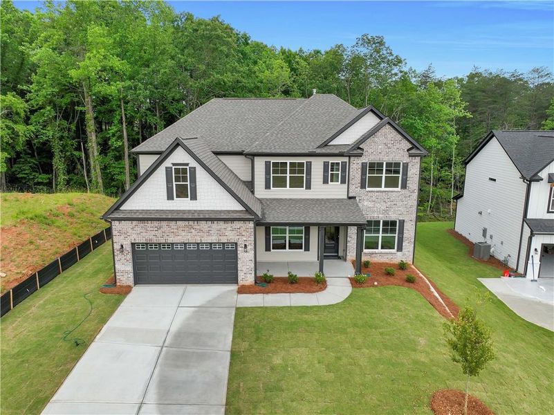 Front exterior of a new home in Arbor West, Dawsonville, GA, highlighting curb appeal (Image 26).