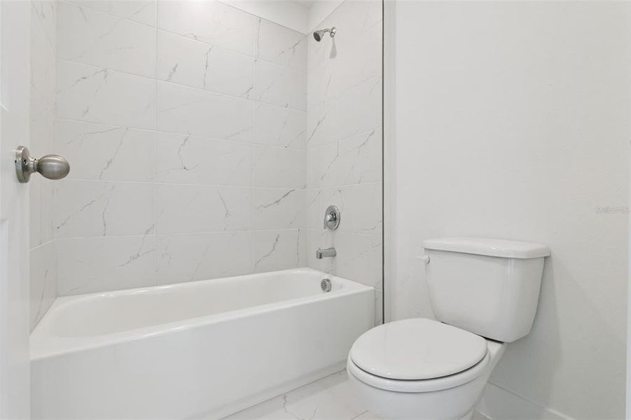 Furnished interior view inside a new home in Eden Crest, Apopka (Image 12).