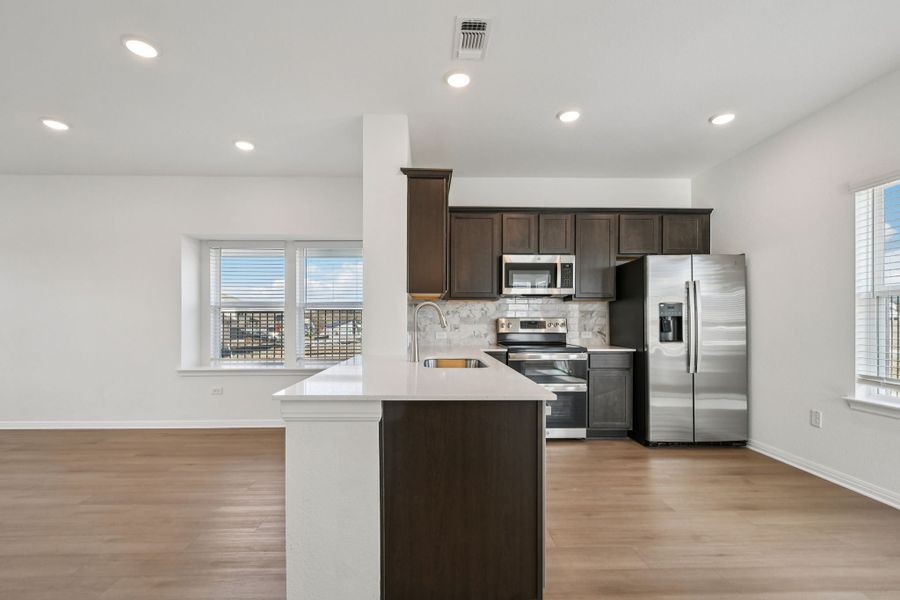 Representative furnished interior of a home built from the Andrews by Pacesetter Homes in Blanco Vista, San Marcos (Image 5).