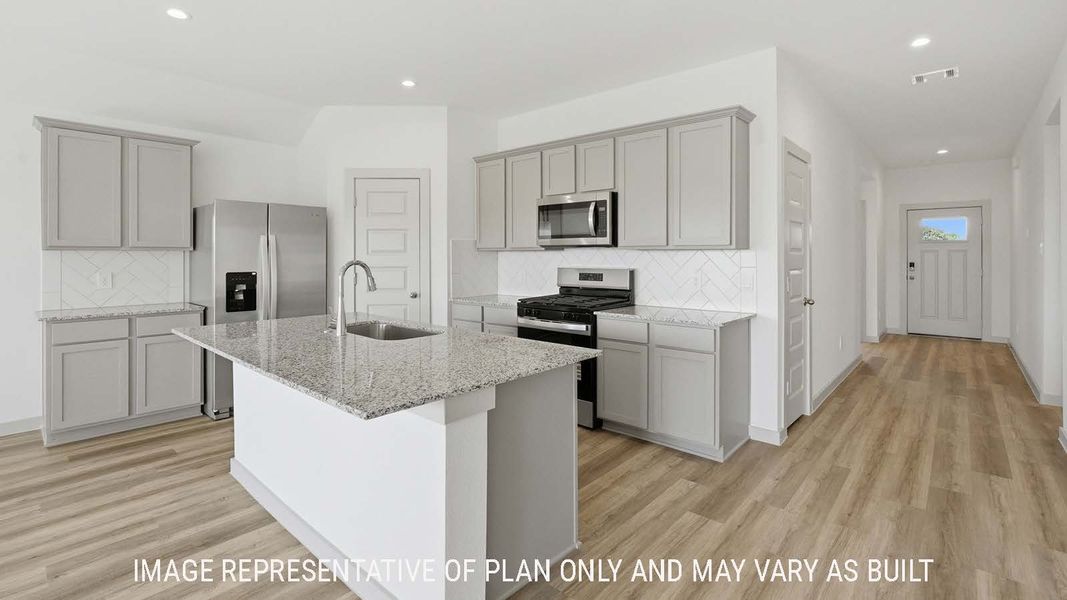 Furnished interior view inside a new home in Reserve at Mallard Lakes, Orange (Image 3).