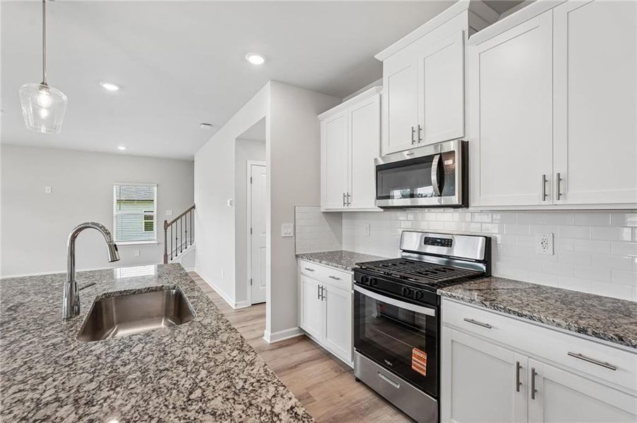 Furnished interior view inside a new home in Northwoods at Mirror Lake, Villa Rica (Image 17).