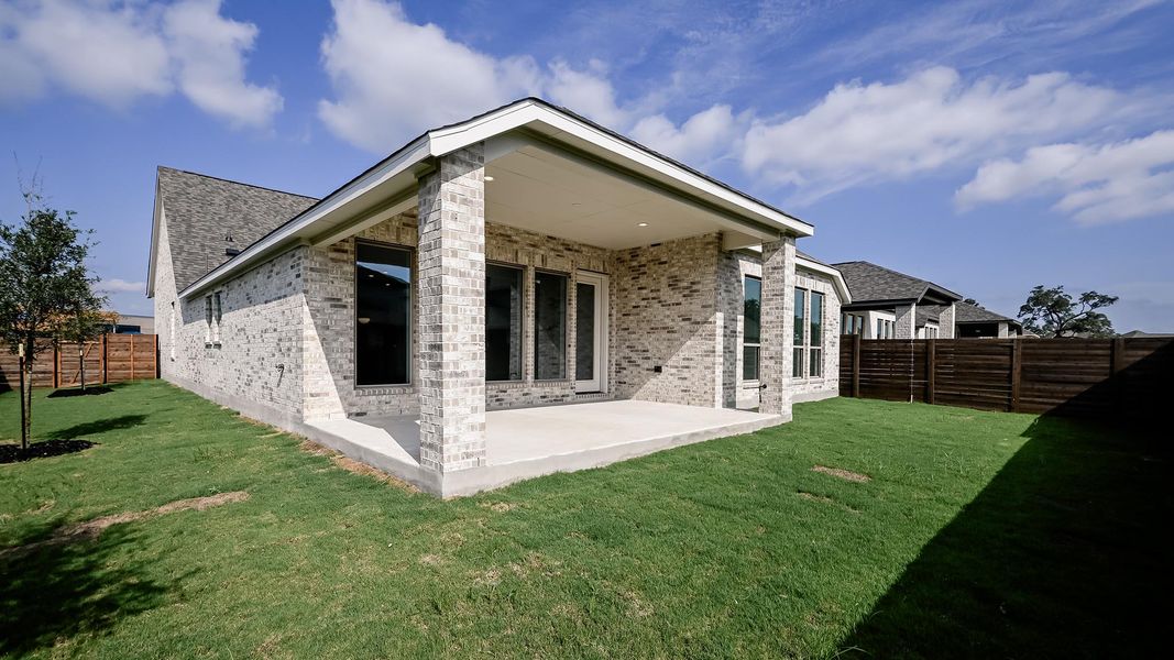 Exterior details and patio area of a home in Juniper Springs, Lockhart (Image 26).