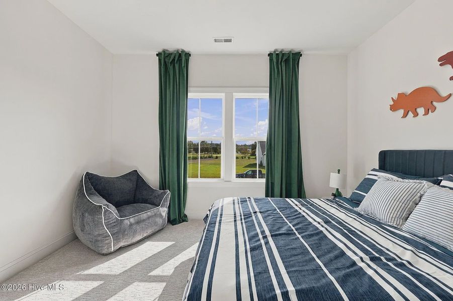 Furnished interior view inside a new home in Dixon Grove, Grimesland (Image 11).