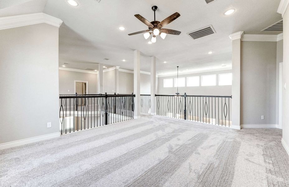 Representative unfurnished interior of a home built from the 4590 by Ravenna Homes in Artavia 70′, Conroe (Image 30).
