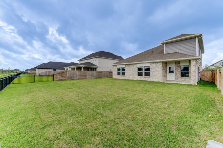 Exterior details and patio area of a home in Arabella on the Prairie, Richmond (Image 29).